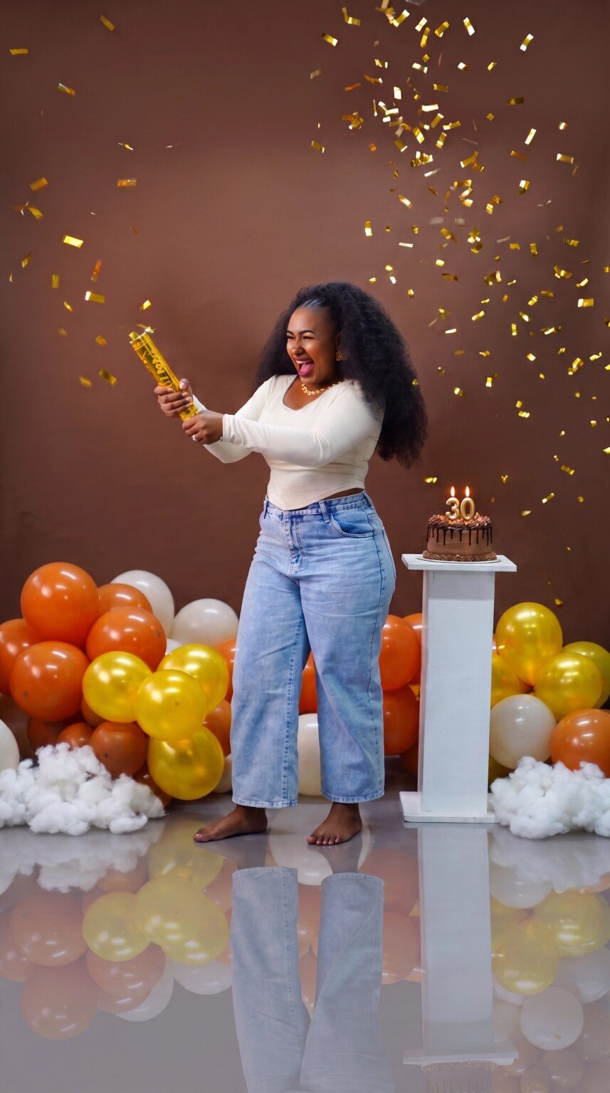 Birthday portrait with balloons and confetti