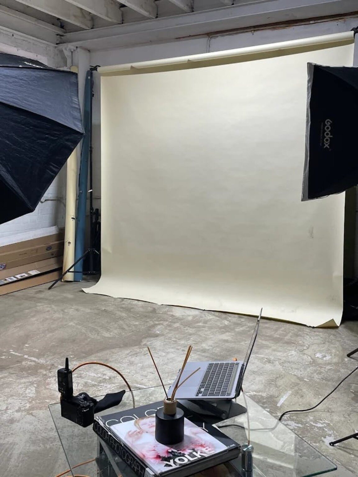 Neen Studios photography setup with backdrop and studio lights